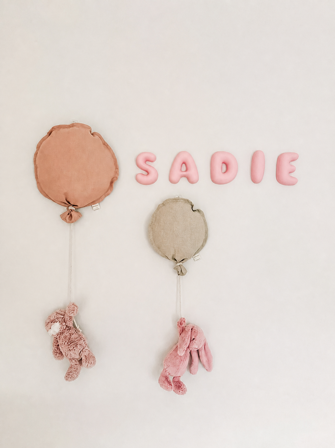Beautiful pink bubble letters in a girls room wall